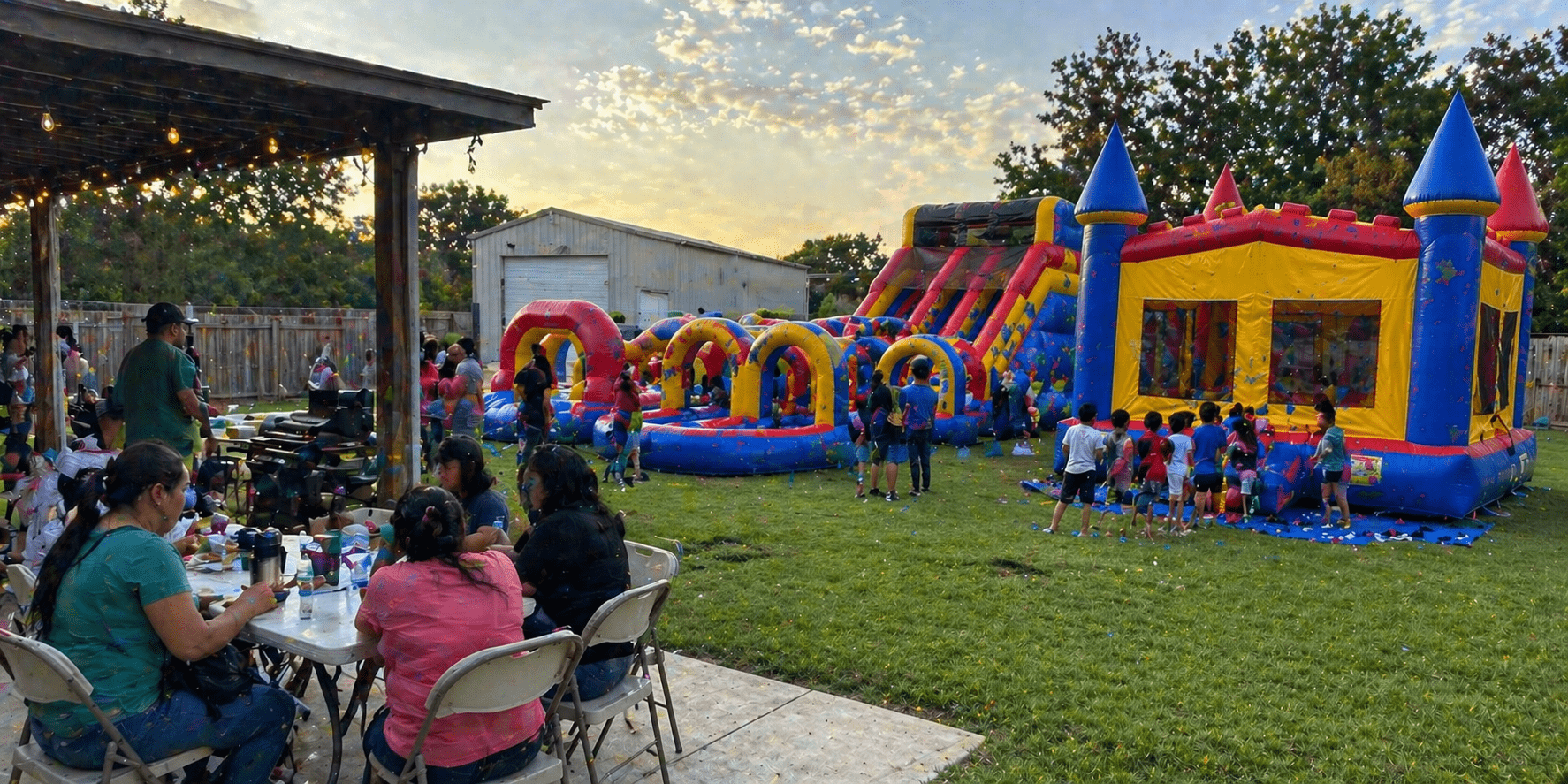 Backyard party with inflatable fun