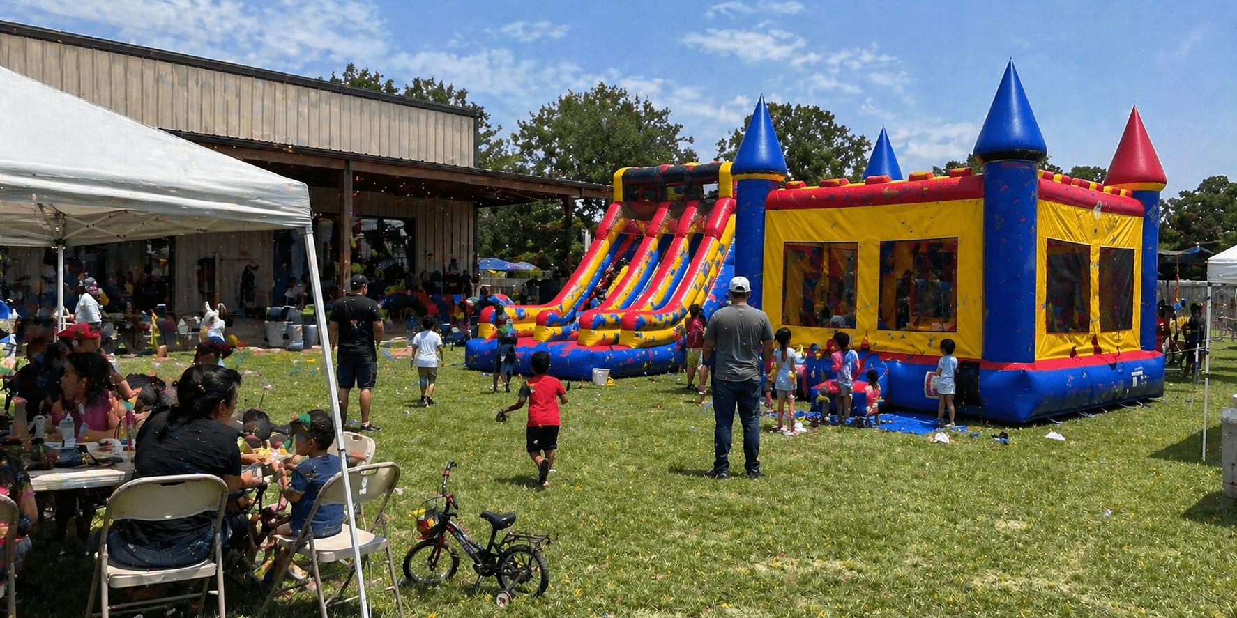 Sunny backyard party with inflatables Forreston, TX