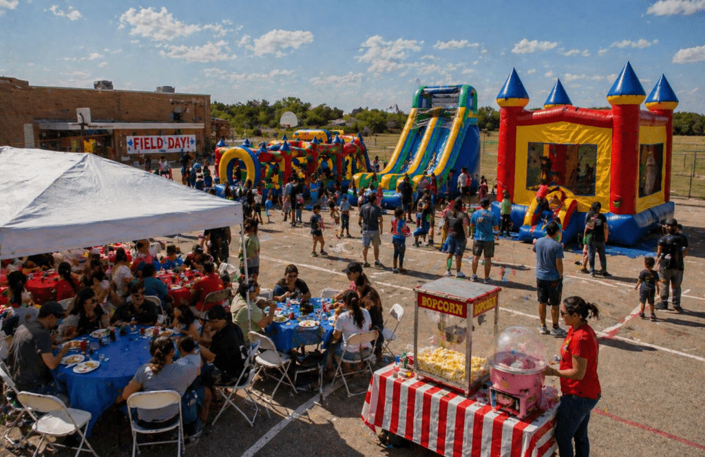 Sunny school festival with inflatables