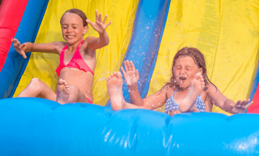 kids sliding down the water slides
